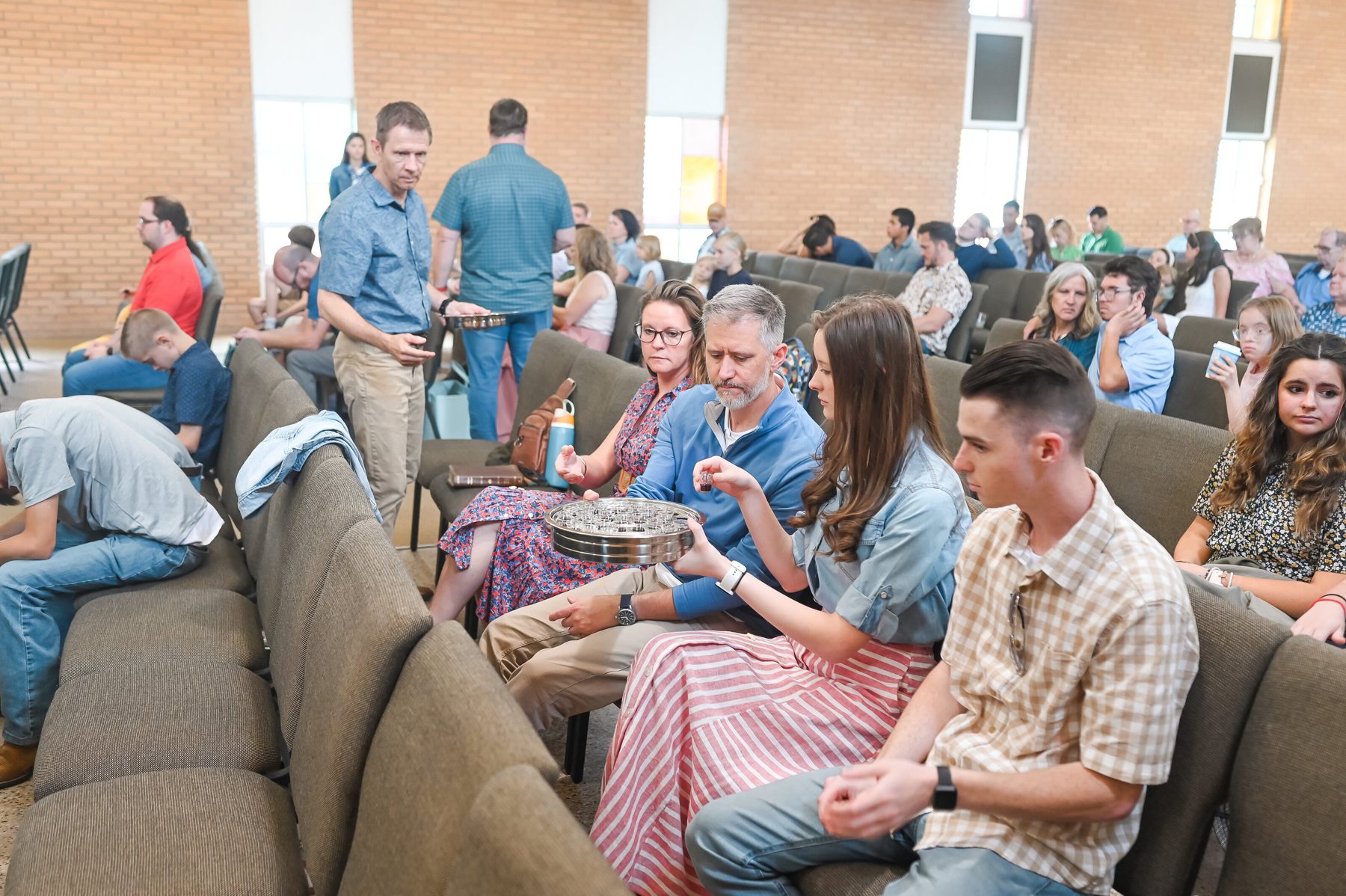 The people of Hope Bible Church talking together before the service